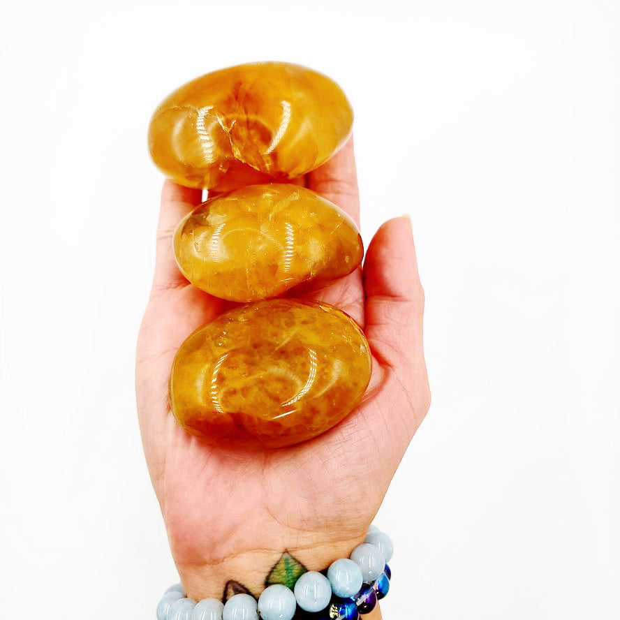 Golden Healer Palm Stone Gallet - Elevated Metaphysical